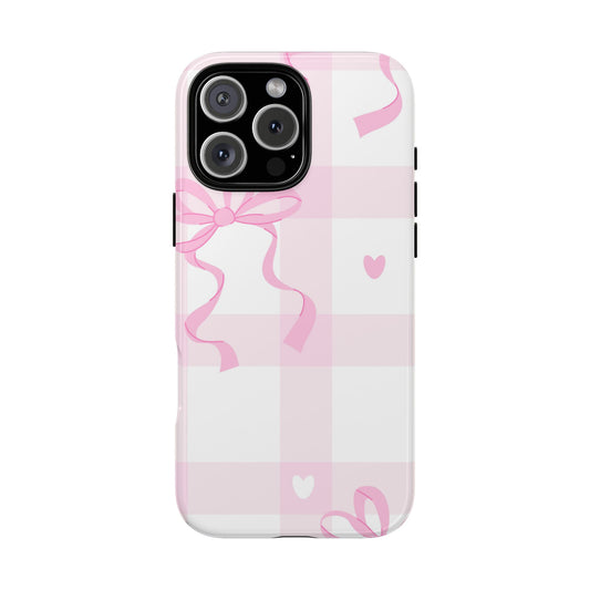 White phone case with pink bows and hearts — cute girly print-on-demand design for iPhone and Samsung accessories