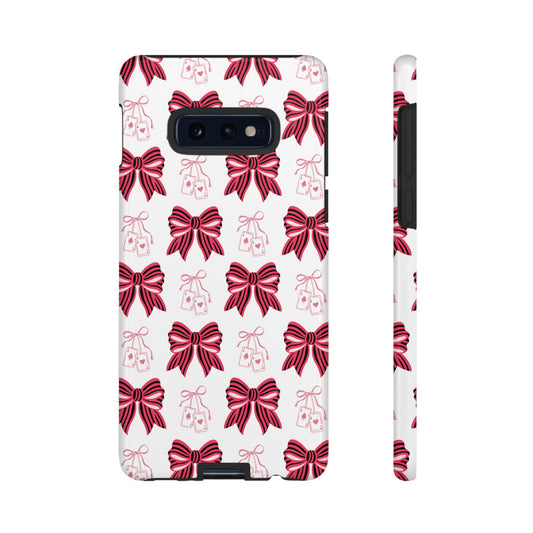 White phone case with red bow pattern — festive print-on-demand design for iPhone and Samsung cases